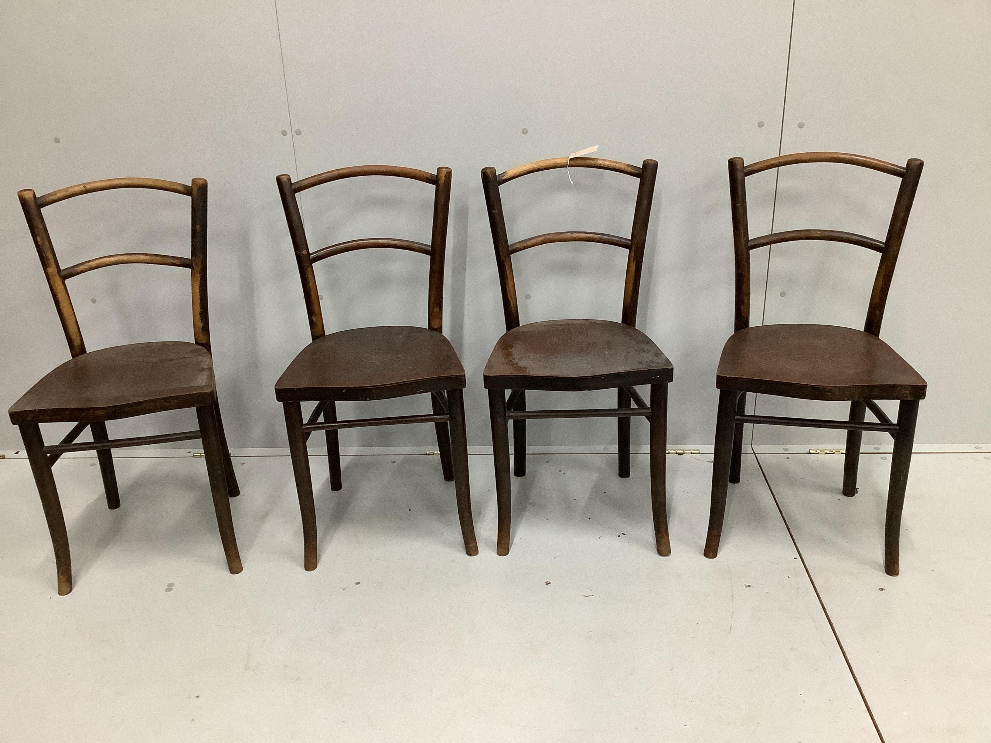 A set of four Polish Mundus bentwood dining chairs